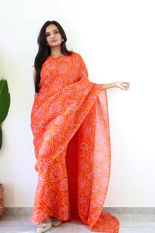 Superhit Orange Color Georgette With Bandhej Print Saree Gown