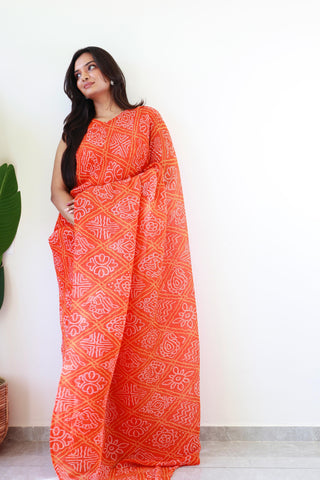 Superhit Orange Color Georgette With Bandhej Print Saree Gown