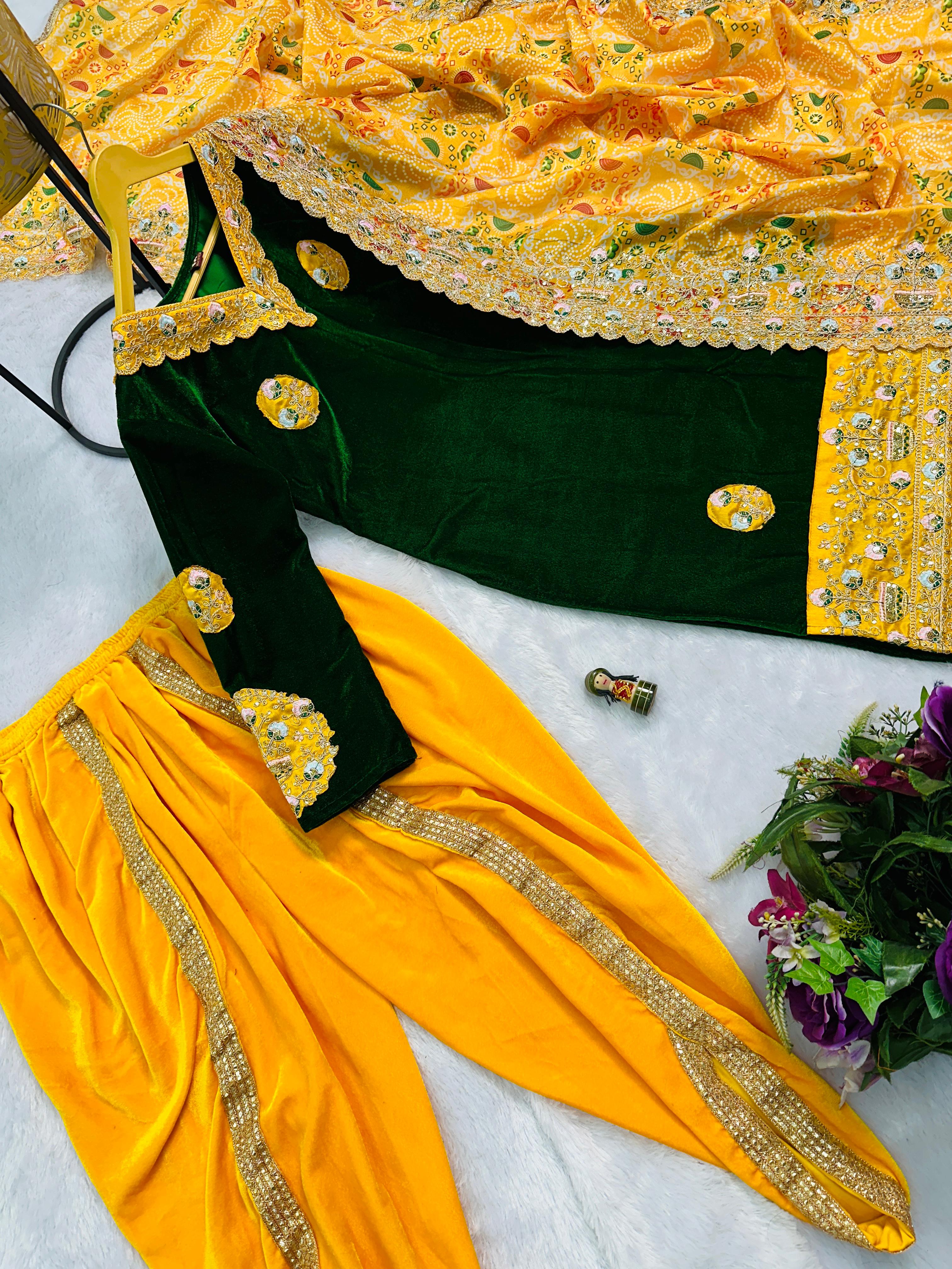 Luxuriant Green And Yellow Color 9000 Velvet Fabric With Embroidered Work Patiyala Suit